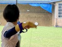 “遠近”で的の中央をねらう姿